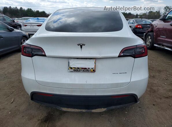 7SAYGDEE3PA051854 2023 TESLA MODEL White Widok z tyłu