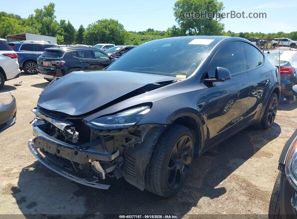 7SAYGDEE3PA204782 2023 TESLA MODEL Y Black Передня ліва чверть