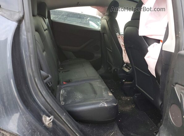 7SAYGDEE3PF850620 2023 TESLA MODEL Gray Rear seats view