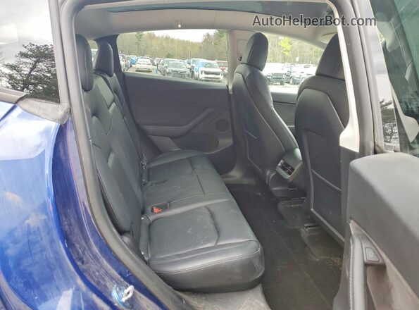7SAYGDEE4NF463183 2022 TESLA MODEL Blue Вид задньої частини салону