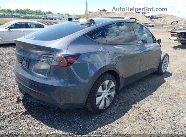 7SAYGDEE4PA106134 2023 TESLA MODEL Y Серый Задняя правая четверть