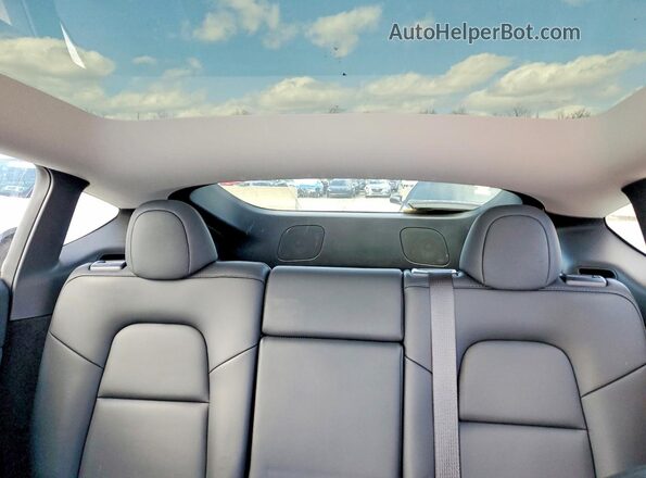 7SAYGDEE4PA120311 2023 TESLA MODEL White Rear seats view