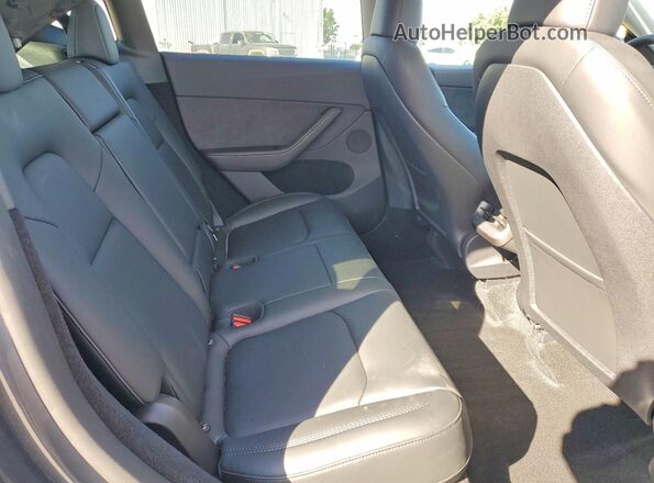 7SAYGDEE4PA158198 2023 TESLA MODEL Фиолетовый Вид задних сидений