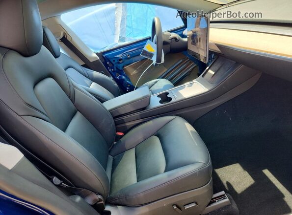 7SAYGDEE4RA219259 2024 TESLA MODEL Blue Front interior view
