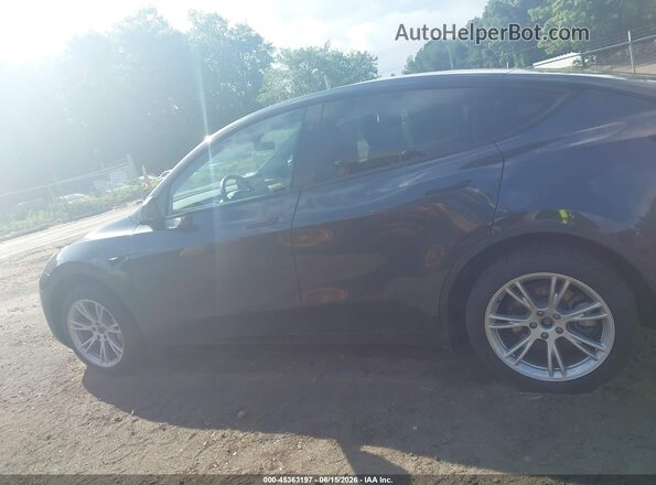 7SAYGDEE4RA274441 2024 TESLA MODEL Y Gray 360 interior view