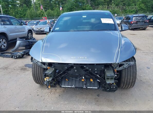 7SAYGDEE4TA670456 2026 TESLA MODEL Y Gray Widok wnętrza z tyłu
