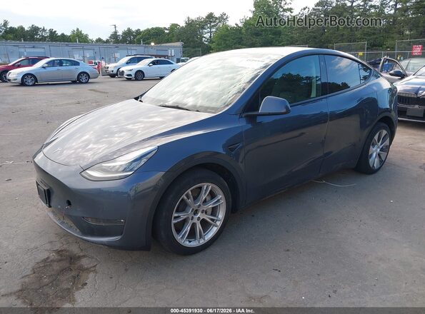 7SAYGDEE5NF398442 2022 TESLA MODEL Y Gray Vista tres cuartos delantera izquierda