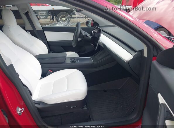 7SAYGDEE5NF419757 2022 TESLA MODEL Y Красный Вид салона спереди