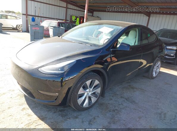 7SAYGDEE5NF536223 2022 TESLA MODEL Y Black წინა მარცხენა ხედი სამი მეოთხედიდან