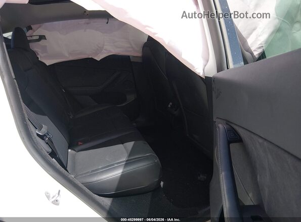 7SAYGDEE5PA032769 2023 TESLA MODEL Y White VIN კოდის სტიკერის ხედი