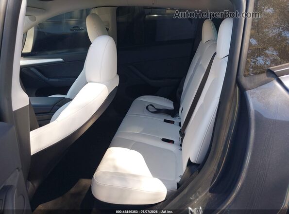 7SAYGDEE5PA161157 2023 TESLA MODEL Y Gray Vista de la etiqueta del VIN