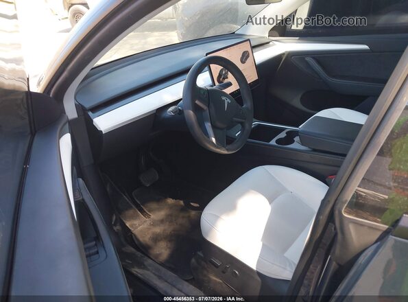 7SAYGDEE5PA161157 2023 TESLA MODEL Y Gray Vista interior delantera