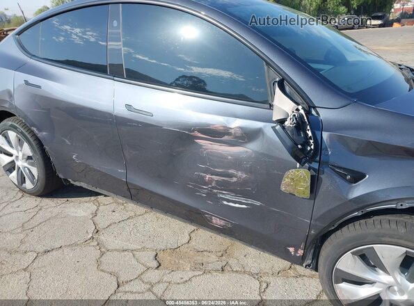 7SAYGDEE5PA161157 2023 TESLA MODEL Y Gray 