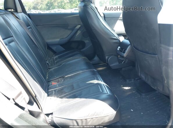 7SAYGDEE5PA179660 2023 TESLA MODEL Y Black VIN კოდის სტიკერის ხედი