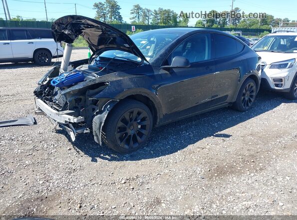 7SAYGDEE5PA179660 2023 TESLA MODEL Y Black წინა მარცხენა ხედი სამი მეოთხედიდან