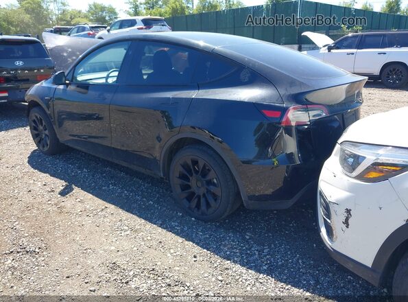 7SAYGDEE5PA179660 2023 TESLA MODEL Y Black უკანა მარცხენა
