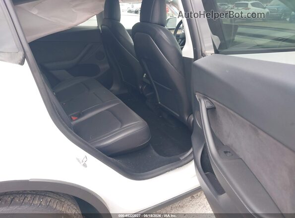 7SAYGDEE5PF607665 2023 TESLA MODEL Y White VIN կոդի պիտակի տեսք