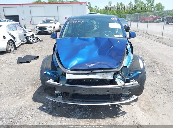 7SAYGDEE5PF692281 2023 TESLA MODEL Y Blue Widok wnętrza z tyłu
