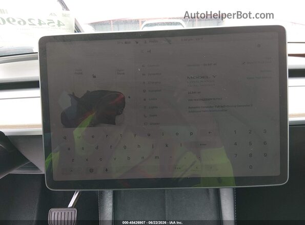 7SAYGDEE5PF757727 2023 TESLA MODEL Y Red 360 interior view