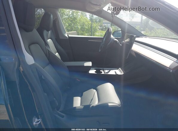 7SAYGDEE5PF802147 2023 TESLA MODEL Y Черный Вид салона спереди