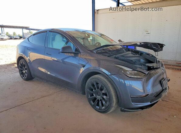 7SAYGDEE5PF879892 2023 TESLA MODEL Gray Front right