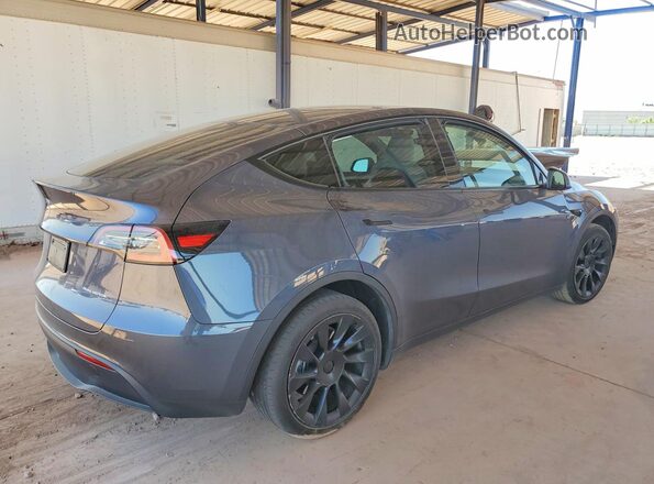 7SAYGDEE5PF879892 2023 TESLA MODEL Gray Rear right