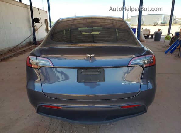 7SAYGDEE5PF879892 2023 TESLA MODEL Gray Rear view
