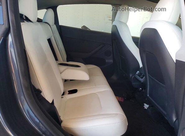 7SAYGDEE5PF879892 2023 TESLA MODEL Gray Rear seats view