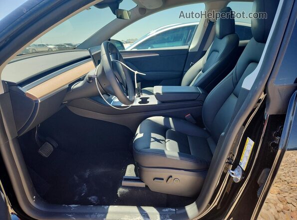 7SAYGDEE5RA269555 2024 TESLA MODEL Черный Вид салона спереди