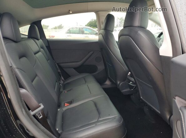 7SAYGDEE5RA269555 2024 TESLA MODEL Черный Вид задней части салона