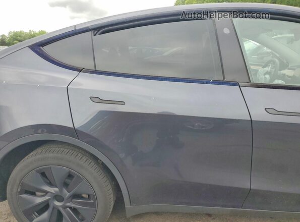 7SAYGDEE5RA292480 2024 TESLA MODEL Gray Rear interior view