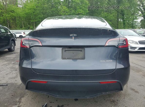 7SAYGDEE5RA292480 2024 TESLA MODEL Gray Rear view