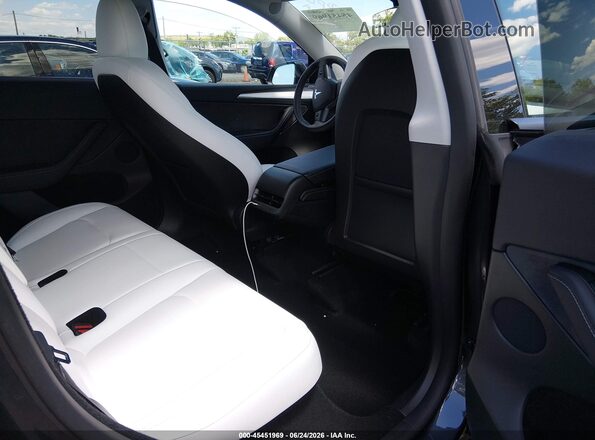 7SAYGDEE5RF170365 2024 TESLA MODEL Y Black VIN sticker view
