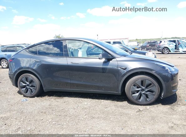 7SAYGDEE5RF170365 2024 TESLA MODEL Y Black Dashboard view