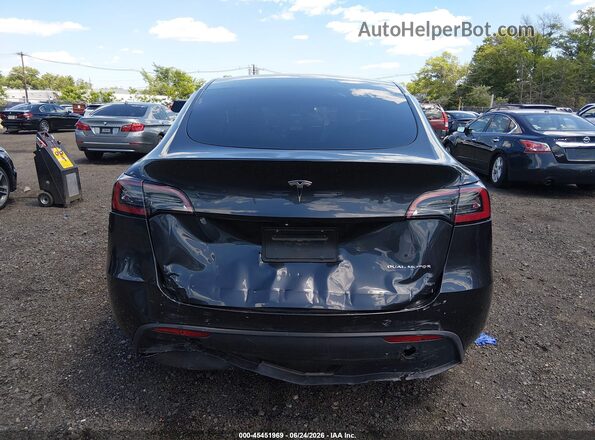 7SAYGDEE5RF170365 2024 TESLA MODEL Y Black 360 interior view