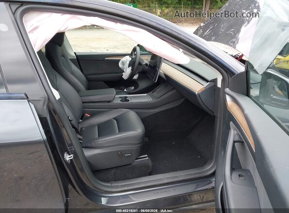 7SAYGDEE5RF995404 2024 TESLA MODEL Y Серый Вид салона спереди