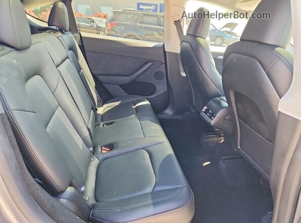 7SAYGDEE5SA359052 2025 TESLA MODEL Gray Rear interior view