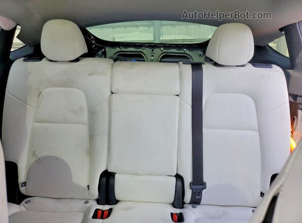 7SAYGDEE5SA360332 2025 TESLA MODEL Charcoal Rear seats view