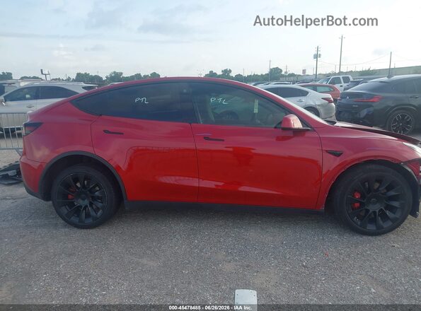 7SAYGDEE6NF395792 2022 TESLA MODEL Y Красный Вид задней части салона