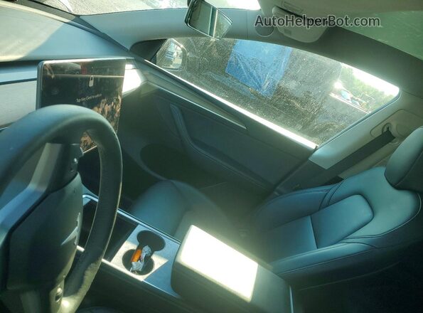 7SAYGDEE6PA058586 2023 TESLA MODEL Black Սարքավորումների վահանակի տեսք