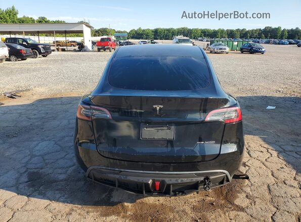 7SAYGDEE6PA058586 2023 TESLA MODEL Black Հետևի տեսք