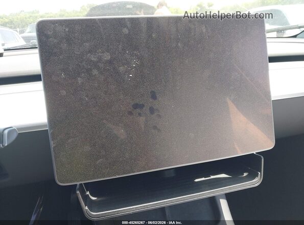 7SAYGDEE6PA167713 2023 TESLA MODEL Y Серый Вид задней части салона