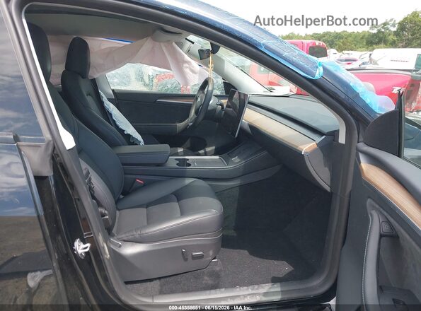 7SAYGDEE6PA171700 2023 TESLA MODEL Y Black Vista interior delantera