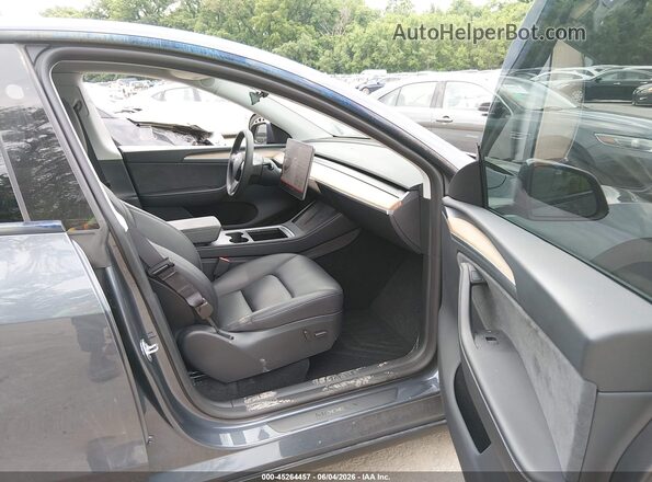 7SAYGDEE6PA199982 2023 TESLA MODEL Y Blue Вид салону спереду
