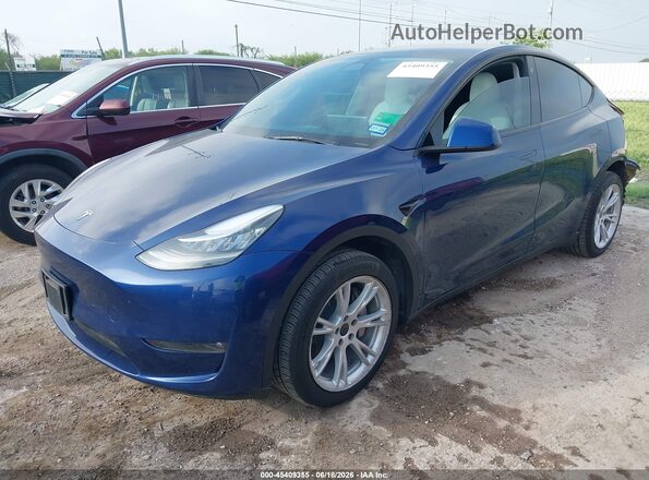 7SAYGDEE6PF604595 2023 TESLA MODEL Y Blue Przód lewy