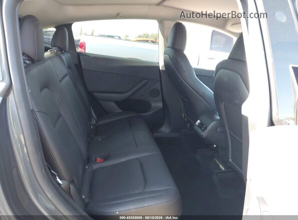7SAYGDEE6PF797668 2023 TESLA MODEL Y Gray VIN կոդի պիտակի տեսք