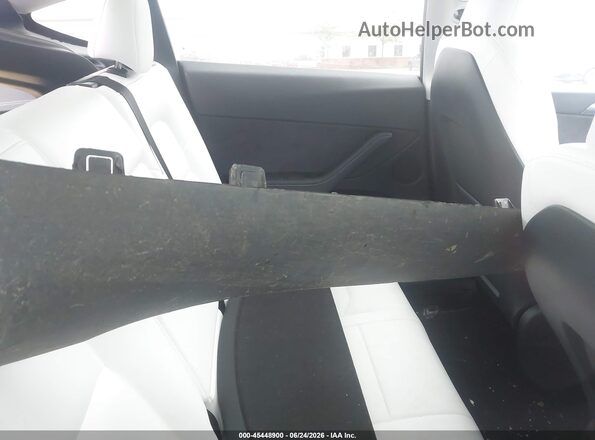 7SAYGDEE6PF935421 2023 TESLA MODEL Y White VIN კოდის სტიკერის ხედი