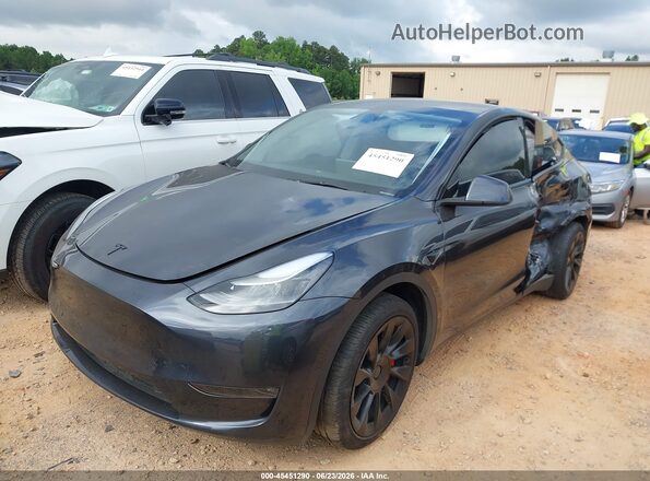 7SAYGDEE6RA222762 2024 TESLA MODEL Y Gray წინა მარცხენა ხედი სამი მეოთხედიდან