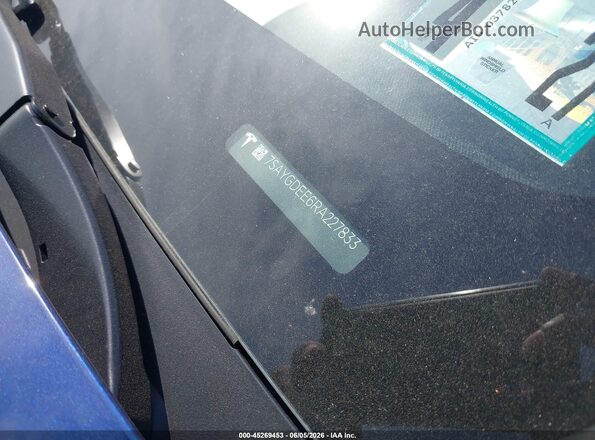 7SAYGDEE6RA227833 2024 TESLA MODEL Y Blue ძრავის განყოფილების ხედი