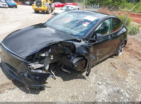7SAYGDEE6TA415341 2026 TESLA MODEL Y Black Przód lewy